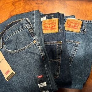 Three pairs of men’s Levi’s - one NWT, two EUC.